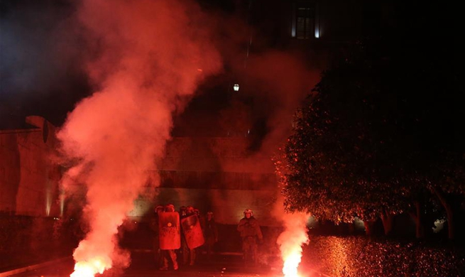 Greeks protest ahead of vote on new austerity measures