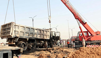 13 people killed in suicide truck bomb in south of Iraq's Baghdad