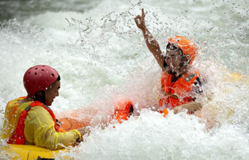 Tourists experience drifting for coolness in Zigui, China's Hubei