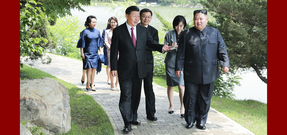 习近平会见朝鲜劳动党委员长、国务委员会委员长金正恩